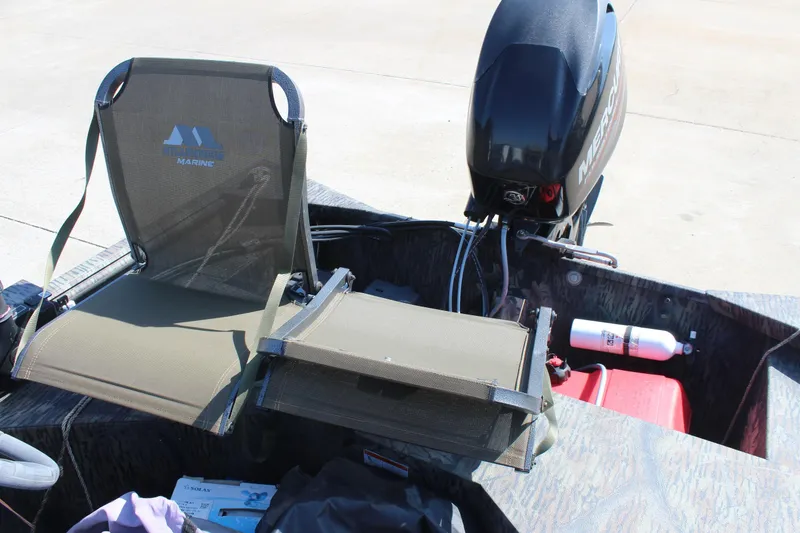 Slide: The Image of 2014 Lowe Roughneck 1756 boat with Mercury engine and marine seating. - 13