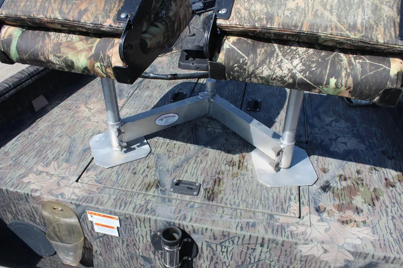 Slide: The Image of 2014 Lowe Roughneck 1756 boat seats with camouflage pattern and sturdy metal supports. - 16