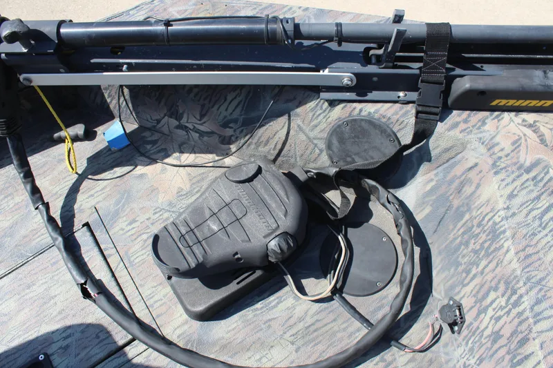 Slide: The Image of 2014 Lowe Roughneck 1756 boat with trolling motor and foot pedal controls. - 19