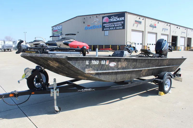 Slide: The Image of 2014 Lowe Roughneck 1756 boat on trailer outside dealership. - 3
