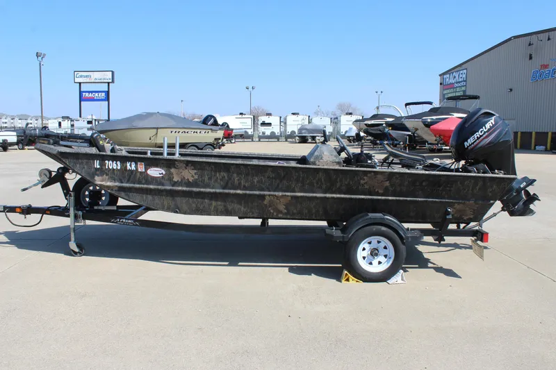 Slide: The Image of 2014 Lowe Roughneck 1756 boat with Mercury engine on trailer in dealership lot. - 4