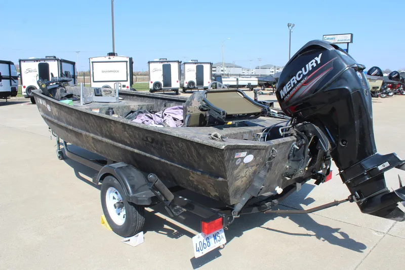 Slide: The Image of 2014 Lowe Roughneck 1756 boat with Mercury outboard motor on trailer. - 5