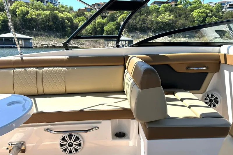 Slide: The Image of Luxurious seating on 2015 Sea Ray 270 Sundeck boat with scenic water view. - 34