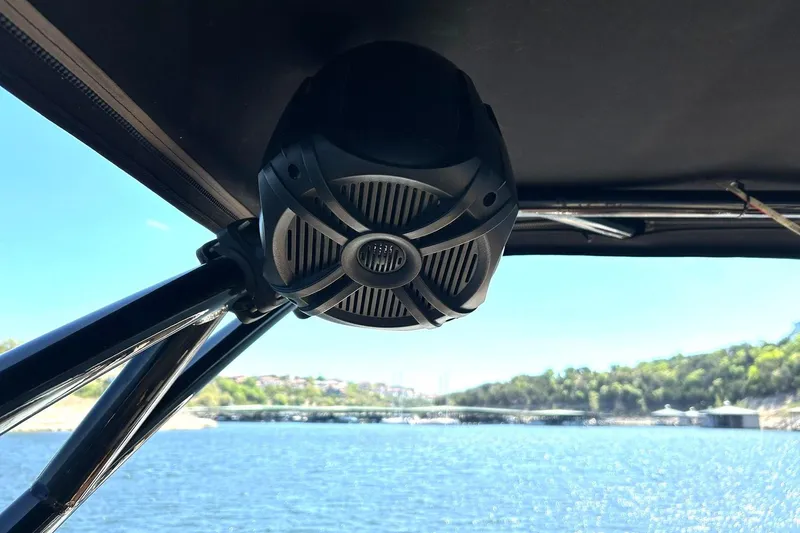Slide: The Image of Speaker on a 2015 Sea Ray 270 Sundeck boat with scenic water view. - 62