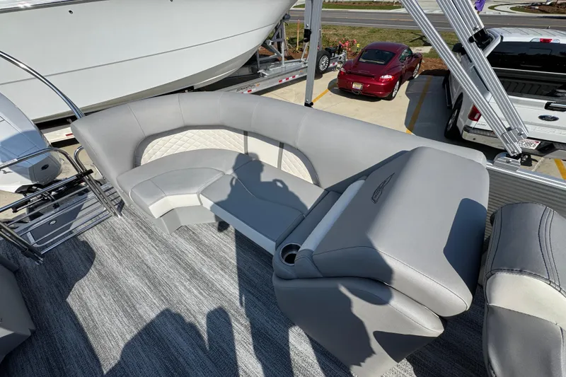 Slide: The Image of 2026 Bennington 22 LFB pontoon boat interior with gray seating and modern design. - 28