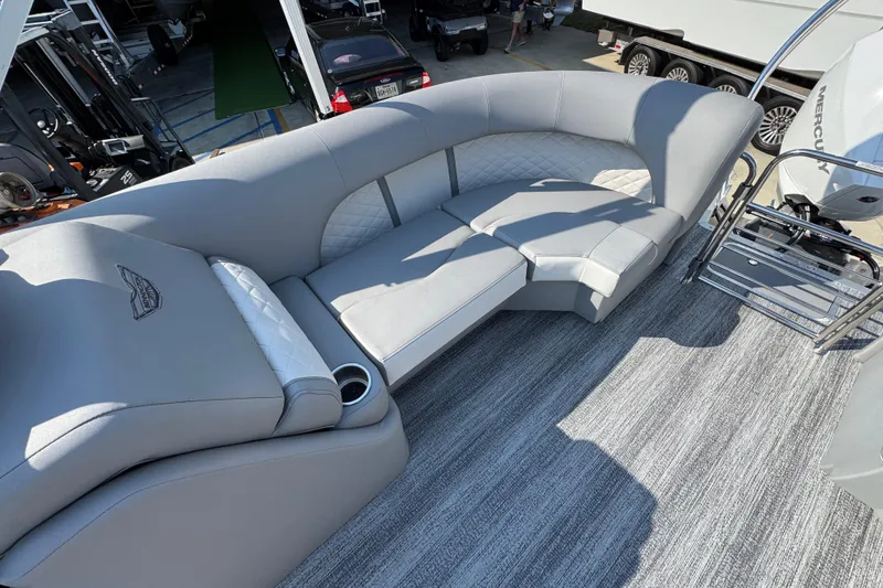 Slide: The Image of 2026 Bennington 22 LFB boat interior with gray seating and modern design. - 29