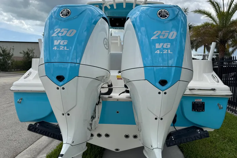 Slide: The Image of 2024 Key West 263 FS boat with twin Yamaha 250 V6 4.2L outboard engines. - 12