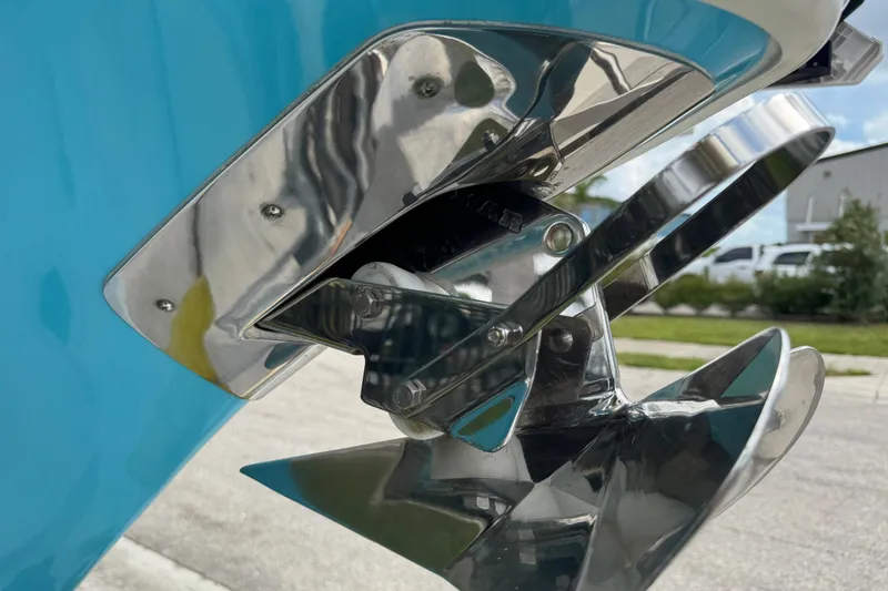 Slide: The Image of Close-up of 2024 Key West 263 FS boat propeller and trim tab in polished metal. - 19