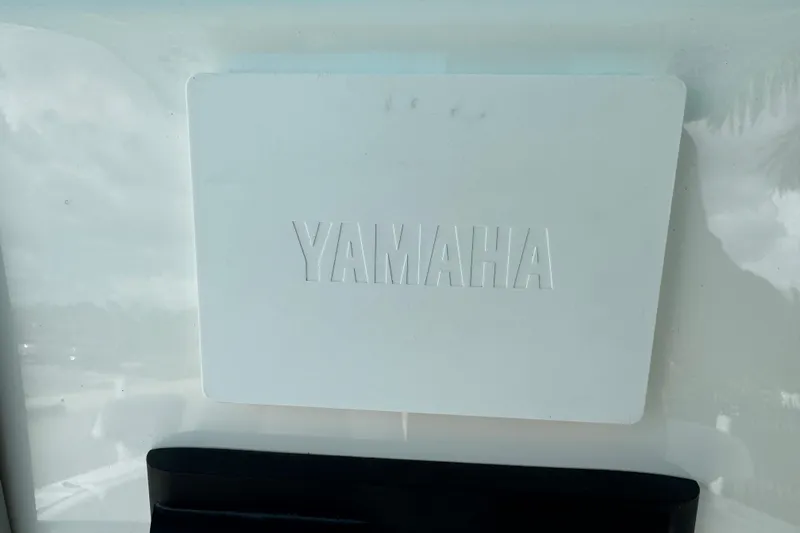 Slide: The Image of Yamaha logo on 2024 Key West 263 FS boat, white background. - 35