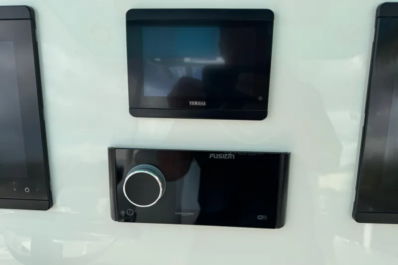 Slide: The Image of 2024 Key West 263 FS dashboard featuring Yamaha and Fusion displays. - 37