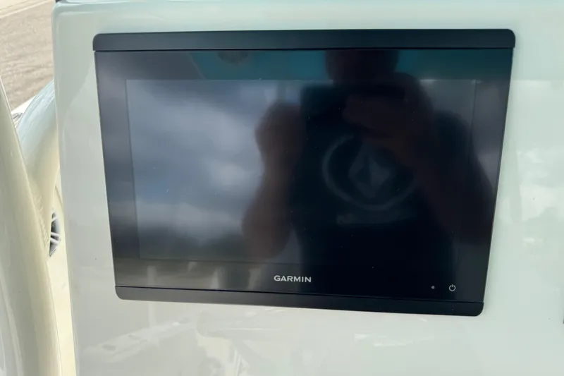 Slide: The Image of Garmin display on 2024 Key West 263 FS boat dashboard. - 38