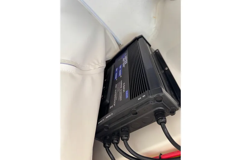 Slide: The Image of Marine battery charger installed in a 2024 Key West 263 FS boat. - 48