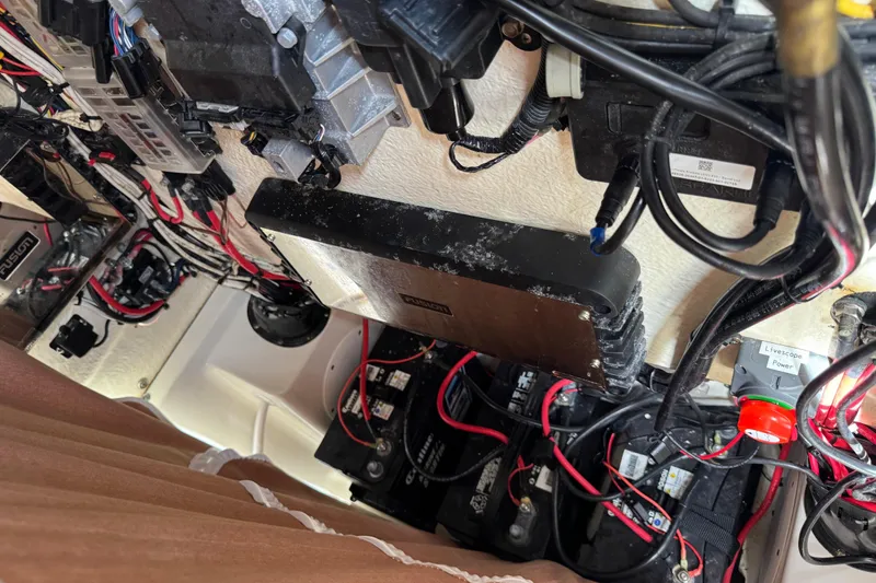 Slide: The Image of Electrical wiring and components inside a 2024 Key West 263 FS boat. - 50