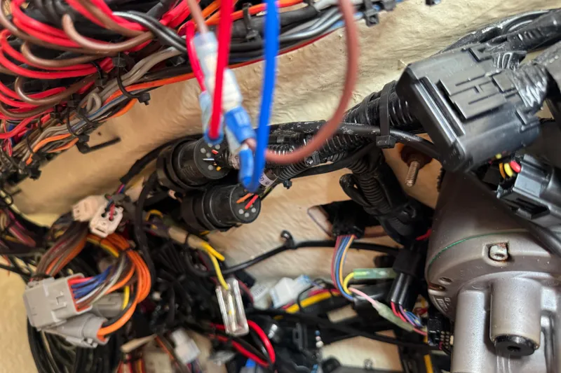 Slide: The Image of Close-up of 2024 Key West 263 FS boat wiring and electrical components. - 51