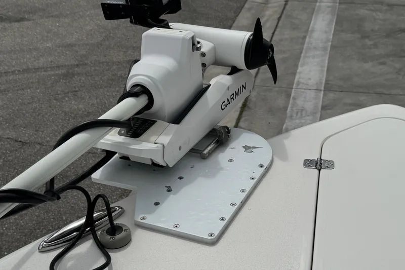 Slide: The Image of 2024 Key West 263 FS boat with Garmin trolling motor on deck. - 58