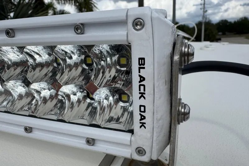 Slide: The Image of LED light bar on 2024 Key West 263 FS boat, featuring Black Oak branding. - 66
