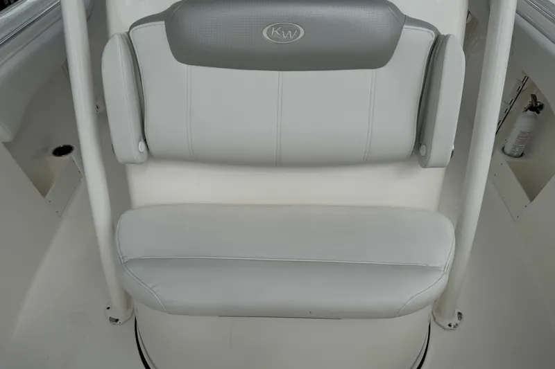 Slide: The Image of 2024 Key West 263 FS boat seat with gray and white upholstery. - 69