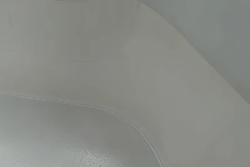 Slide: The Image of 2024 Key West 263 FS boat interior detail, showcasing sleek white surface design. - 72