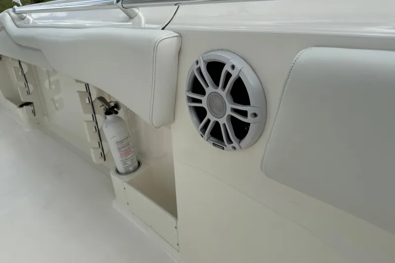 Slide: The Image of 2024 Key West 263 FS boat interior with speaker and fire extinguisher. - 73