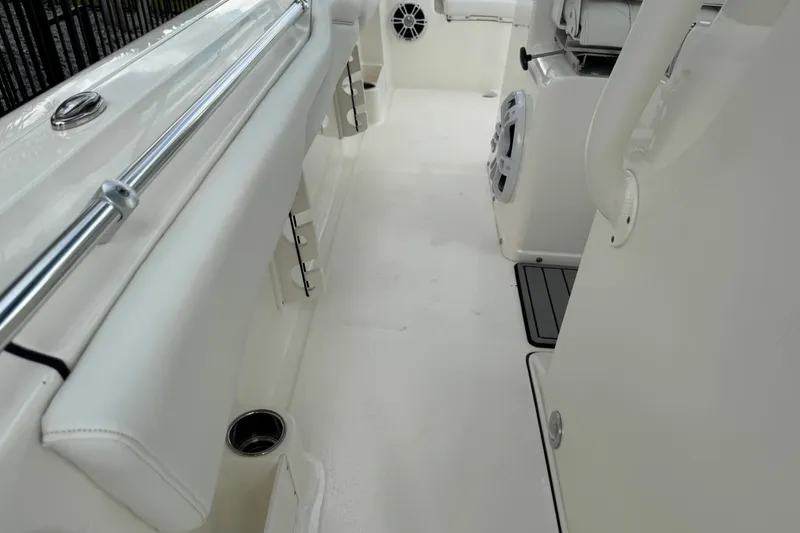 Slide: The Image of 2024 Key West 263 FS boat interior with seating and speaker system. - 75