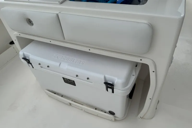 Slide: The Image of 2024 Key West 263 FS boat interior with cooler storage compartment. - 79