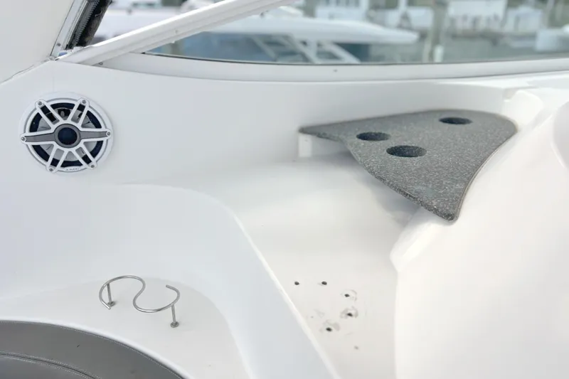 Slide: The Image of 2005 Cruisers Yachts 440 Express interior with speaker and cup holder. - 17