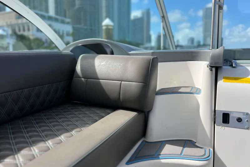 Slide: The Image of Interior of 2005 Cruisers Yachts 440 Express with leather seating and cityscape view. - 28