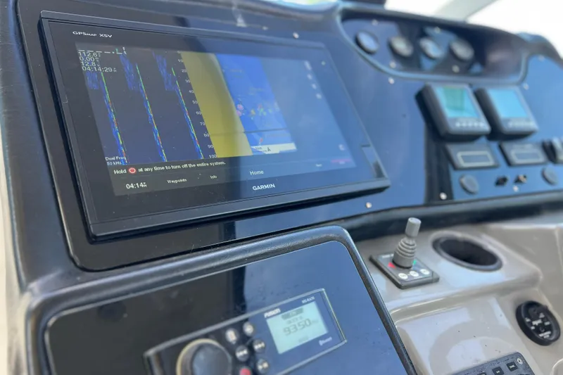 Slide: The Image of Dashboard of a 2005 Cruisers Yachts 440 Express with Garmin GPS system. - 35