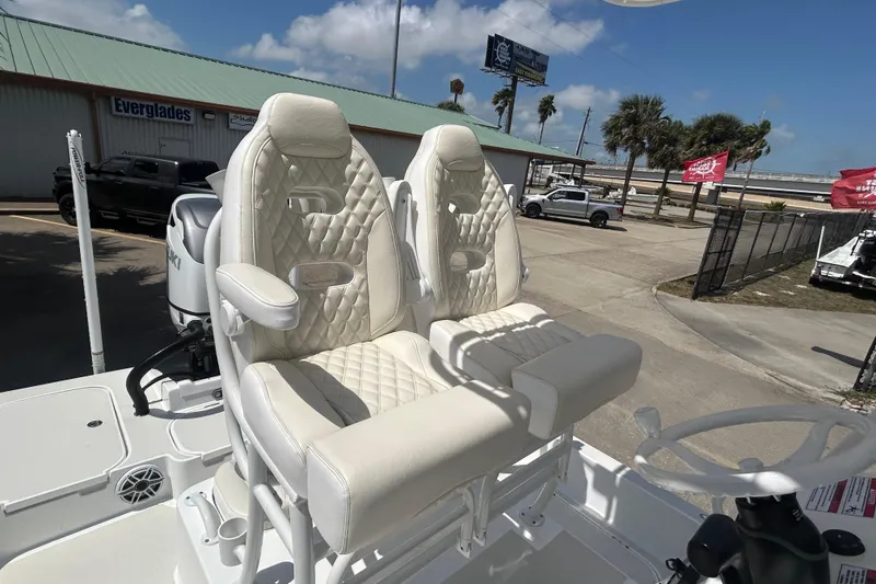 Slide: The Image of Luxury seating on 2026 Shallow Sport 25 X3 boat, featuring plush, diamond-stitched upholstery. - 32