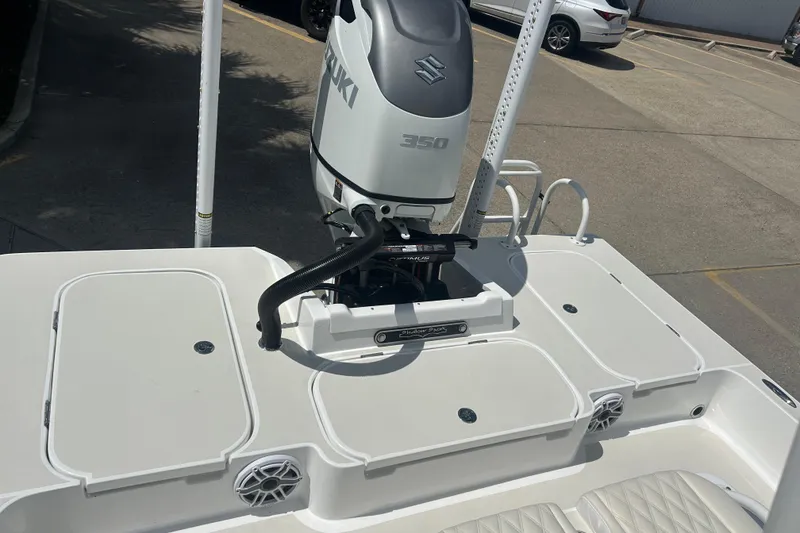 Slide: The Image of 2026 Shallow Sport 25 X3 boat with Suzuki 350 engine in parking lot. - 38