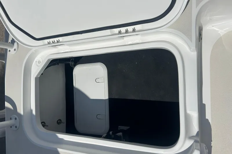 Slide: The Image of Open storage compartment on a 2026 Shallow Sport 25 X3 boat. - 40