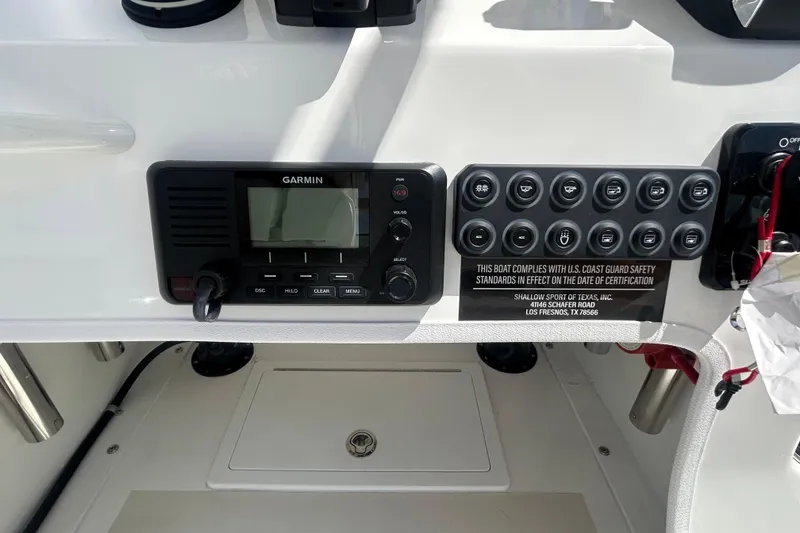 Slide: The Image of Control panel of a 2026 Shallow Sport 25 X3 boat with Garmin device. - 42