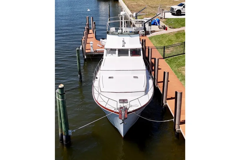 Slide: The Image of 2006 Huckins Atlantic 44 yacht docked at a marina, aerial view. - 12