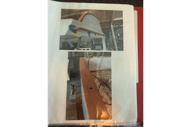 Slide: The Image of 2006 Huckins Atlantic 44 boat under construction, showcasing hull and deck details. - 38