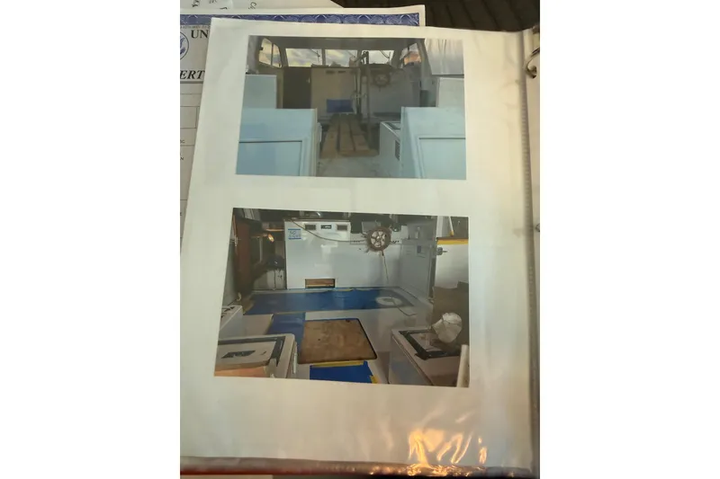 Slide: The Image of Photos of the 2006 Huckins Atlantic 44 yacht interior, showcasing helm and deck areas. - 39