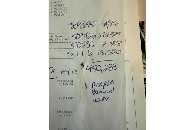 Slide: The Image of Handwritten calculations on a document, including boat name "Lady Elizabeth" and financial estimates. - 55