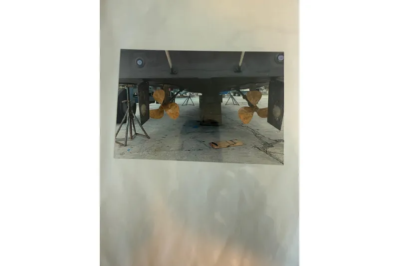 Slide: The Image of Underwater view of 2006 Huckins Atlantic 44 propellers on dry dock. - 58