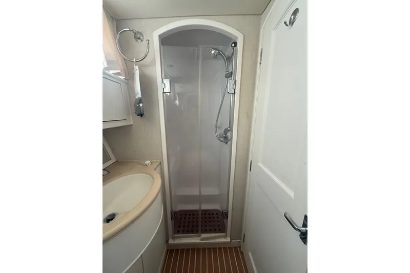 Slide: The Image of Bathroom with shower in 2006 Huckins Atlantic 44 yacht. - 64
