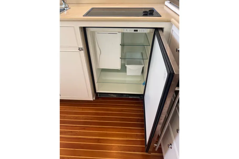 Slide: The Image of Open refrigerator in the galley of a 2006 Huckins Atlantic 44 yacht. - 68