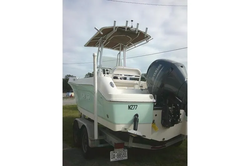 Slide: The Image of 2016 Robalo R200 Center Console boat with Yamaha outboard motor on trailer. - 12