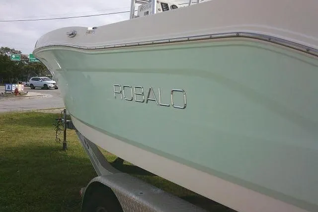 Slide: The Image of 2016 Robalo R200 Center Console boat on trailer, side view. - 13