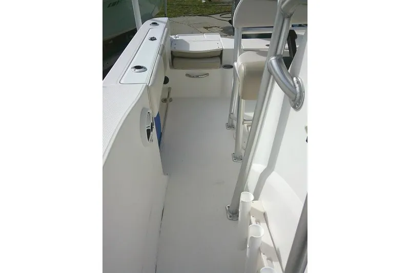 Slide: The Image of 2016 Robalo R200 Center Console boat interior with seating and storage features. - 25