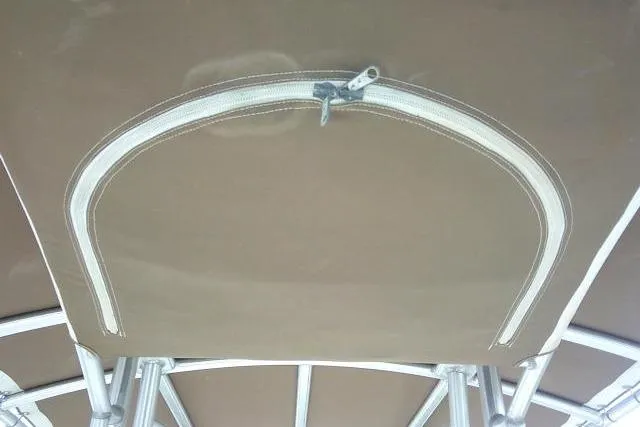 Slide: The Image of 2016 Robalo R200 Center Console boat canopy with zippered opening. - 39