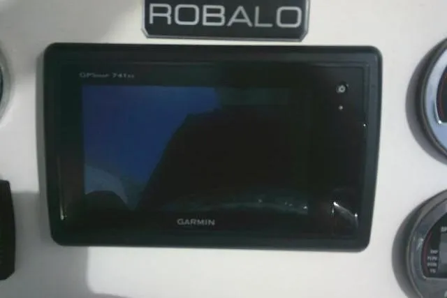 Slide: The Image of Garmin GPS display on 2016 Robalo R200 Center Console boat dashboard. - 42