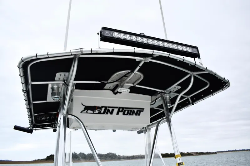 Slide: The Image of T-top of 2001 Fountain 31 Tournament Edition boat with LED light bar. - 16