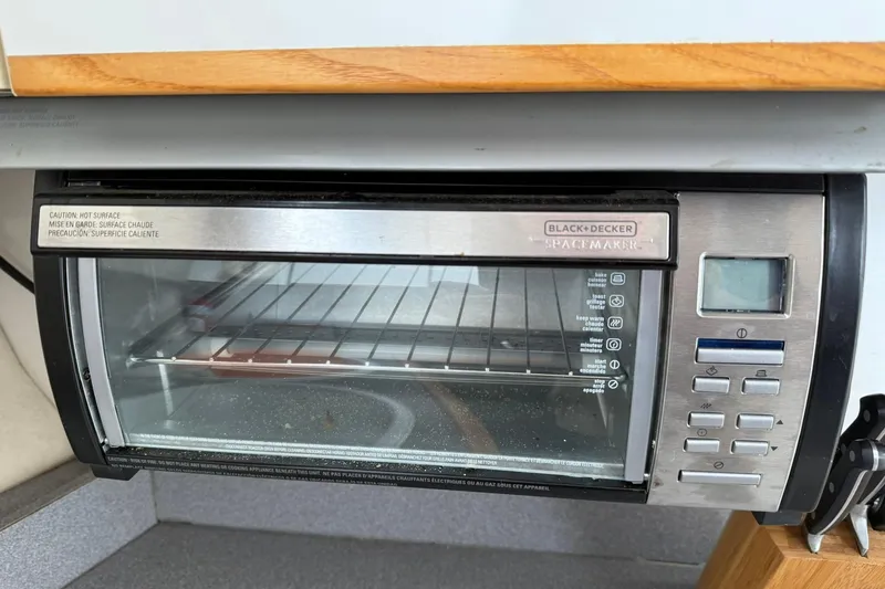 Slide: The Image of Black & Decker Spacemaker toaster oven in 1991 Bayliner 4387 Motoryacht kitchen. - 23