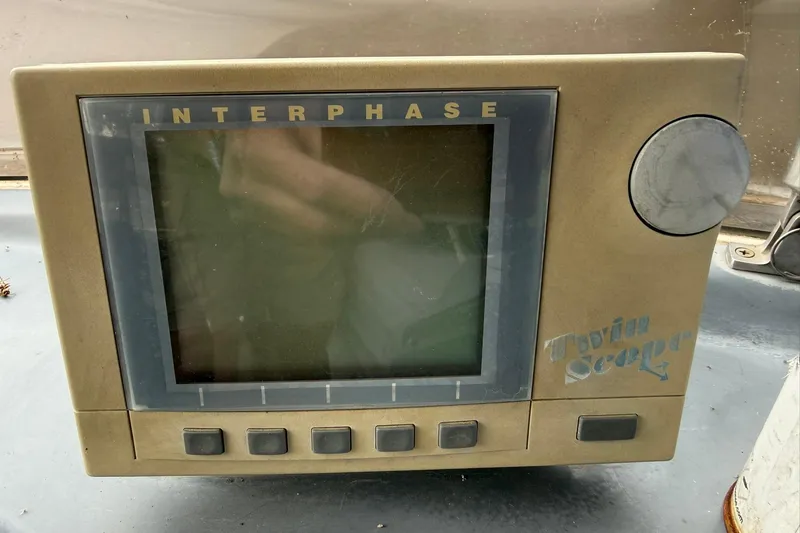 Slide: The Image of Interphase Twin Scope display on 1991 Bayliner 4387 Motoryacht dashboard. - 8