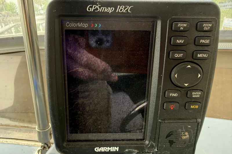 Slide: The Image of Garmin GPSmap 182C on 1991 Bayliner 4387 Motoryacht dashboard. - 9