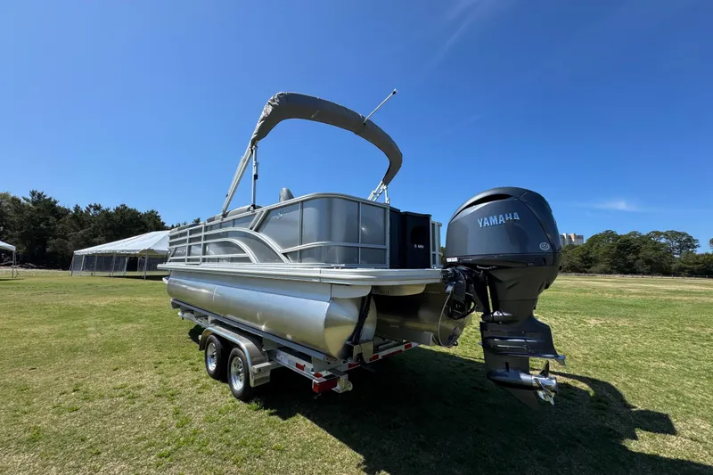 Slide: The Image of 2026 Bennington 22 S Fish pontoon boat with Yamaha motor on a trailer. - 10