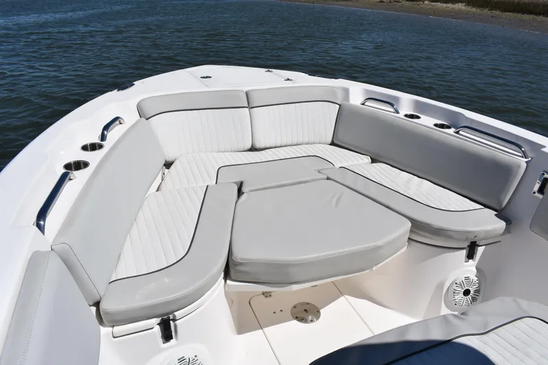 Slide: The Image of 2021 Sea Fox 268 Commander boat with spacious seating area on calm water. - 10